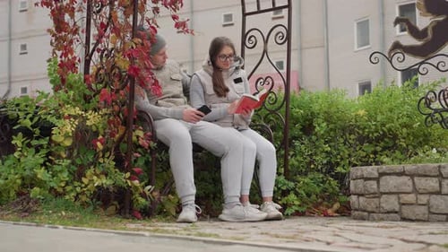 Lovers Sharing Peaceful Outdoor Moment Together in Garden with Autumn Breeze