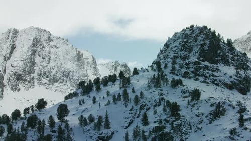 The Snow Covered Peaks, Steep Cliffs And Glacial Valleys Of The Madison Mountain Range In Southwe...