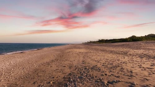 Sunset Empty Sandy Beach Near the Ocean