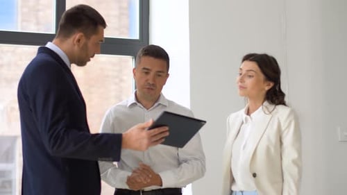 Real Estate Agent Meeting with Clients