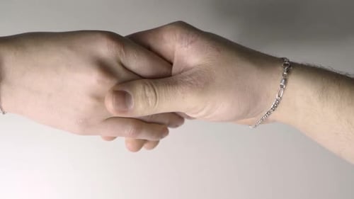 Slow Motion Of A Man Holding Woman's Hand And Gently Caress It. - Close Up Shot