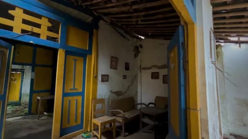 Dilapidated and Abandoned Home Interior with Old Furniture