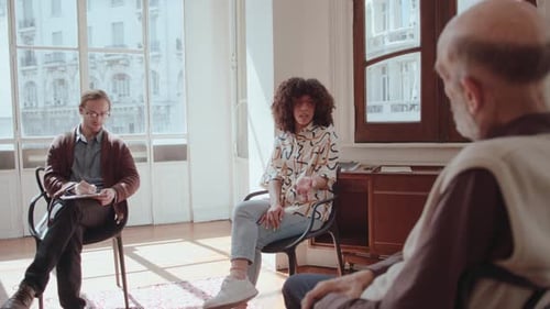 Therapy Session with People Talking in Urban Office