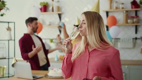 Enjoying Celebration Moments with Friends at a Festive and Joyful Party Atmosphere