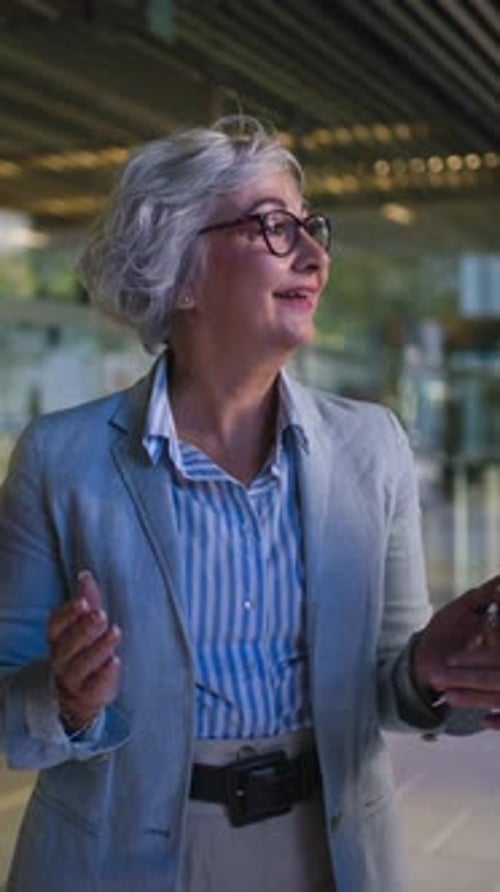 Three Diverse Adult Professionals Female Meeting Talking Happy and Laughing in Office Corridor
