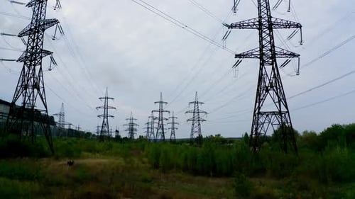 Electricity Pylons in a Green Field