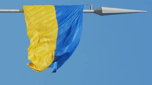 Flag Waving Against a Blue Sky
