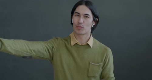 Adult Man Talking to Camera During Video Call