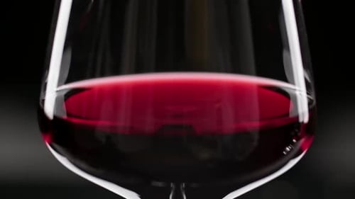 Red Wine in Glass with Single Drop