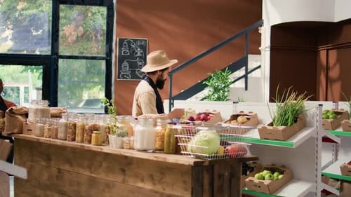 Grocer at Local Market Selling Fresh Produce