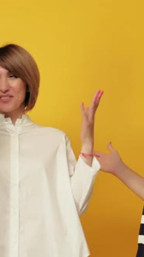 Three Women Smiling and Laughing in Studio