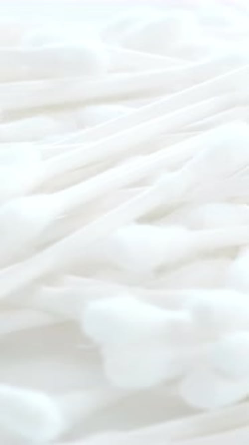 White Cotton Swabs Cotton Swab on a Clean White Background Vertical Video