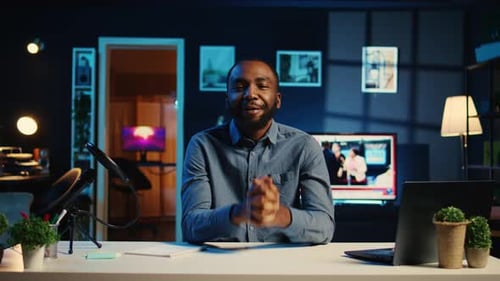 Man Talking to Camera in Office Setting