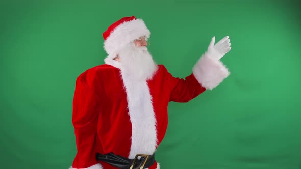 Santa points to subscription on green screen, customizable ad., People ...