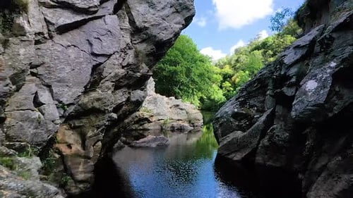 Aerial view of river down canyon.