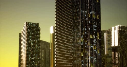 Edificios modernos de gran altura iluminados durante la puesta de sol en un área metropolitana
