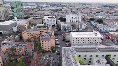 Urban Neighborhood East Of Downtown Los Angeles In California. Drone Cityscape Flyover.