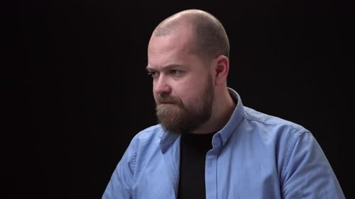 Man Expressing Anger in a Close Up Shot