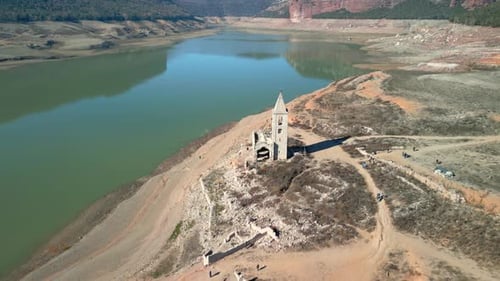 Sau swamp dike in Catalonia, Spain, intense drought in 2024 church completely out of the water.