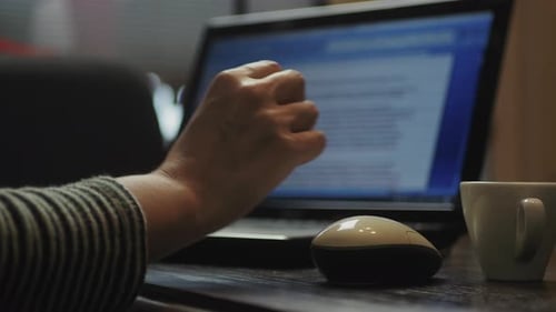 Real woman work at home office, female freelancer. Working at home during pandemic. Typing on keyboa