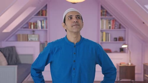 Man in White Cap Thinking Indoors