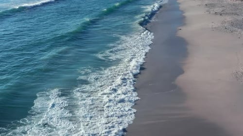 Foamy Sea Waves Of Blouberg Beach In South Africa - aerial drone shot