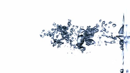 Bubbles of water forming in a horizontal line