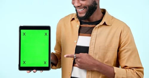 Green screen, tablet mock up and pointing in studio with website, internet and social network