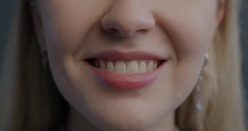 Woman's Attractive Smile Close Up