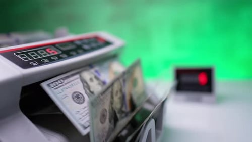 Counting Cash with Money Counter Machine