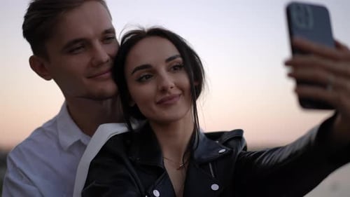 Romantic Couple Taking Selfie at Sunset
