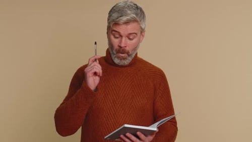 Adult Writing Ideas in Notebook