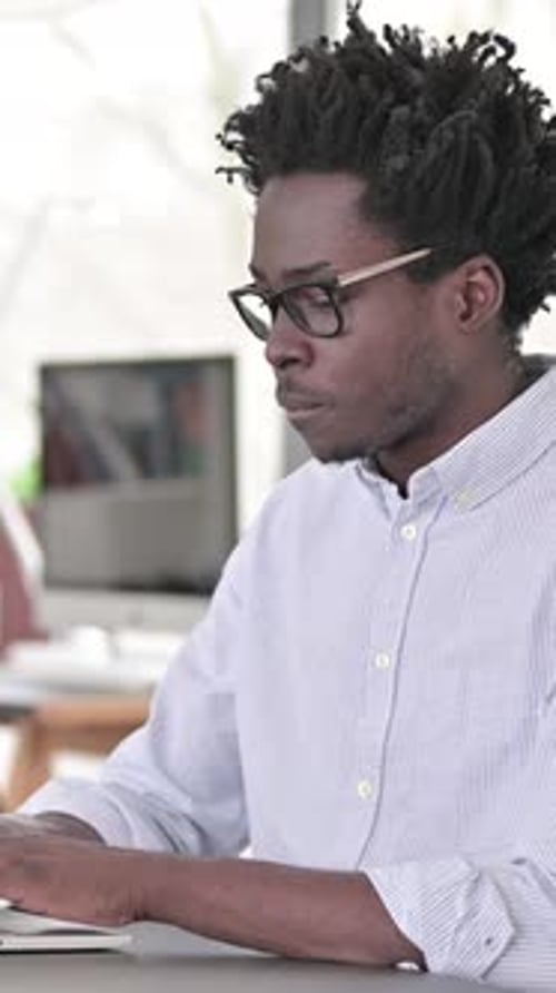 Man Working on Laptop in Office, Close Up