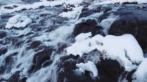 Waterfall in Iceland Snowy Ice Mountain River in Winter Nature