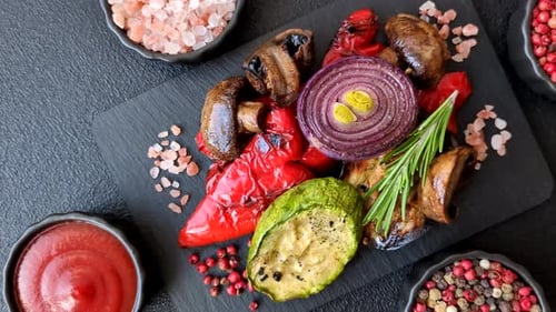 Grilled vegetables: bell peppers, zucchini, eggplant, onions, and corn. Grilled vegetables