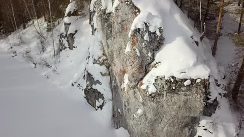 A Beautiful Snow Covered Rocky Landscape in the Winter Season Perfect for Exploration Stock Clip