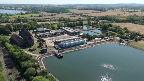 Aerial View of an Industrial Facility by the Lake in the UK