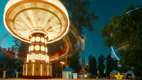 Brightly Illuminated Rotating High Speed Carousel Merrygoround
