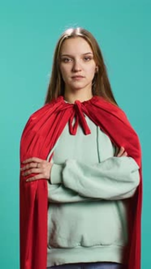 Vertical Video Portrait of Cheerful Heroic Person Posing As Hero in Costume