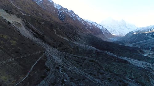 Majestic Mountain Range Aerial View with Hikers