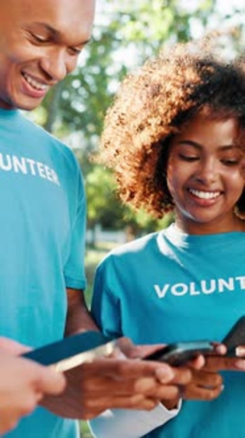 Volunteer team, people and phone at park with laughing, global connection or funny NGO website