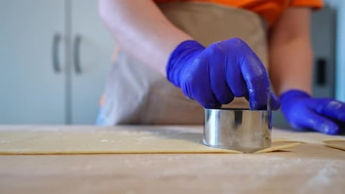 Cutting Cookies from Dough with Cookie Cutter