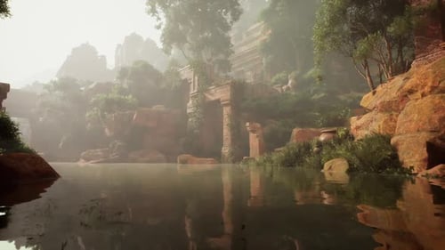 Lake Surrounded By Trees and Rocks in Forest
