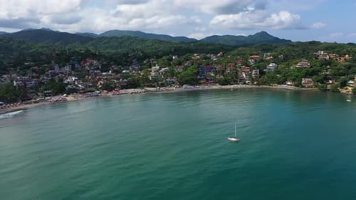 Tropical Beach and Town View from Above