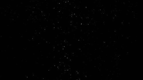 Abstract Animated White Particles on Black Background