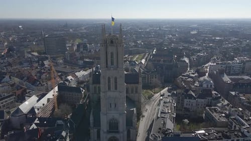 High aerial approach to St. Bavo's Cathedral in Ghent Belgium