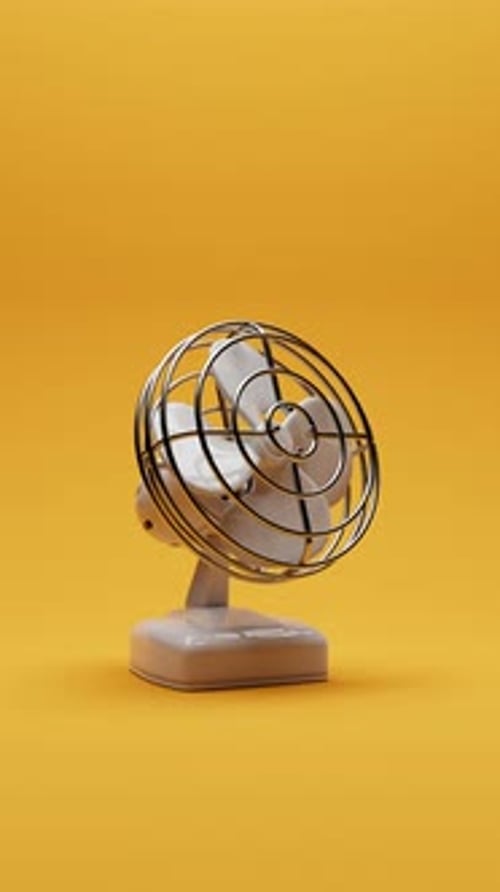 Cute Looping Retro Oscillating Electric Fan Over Orange Background