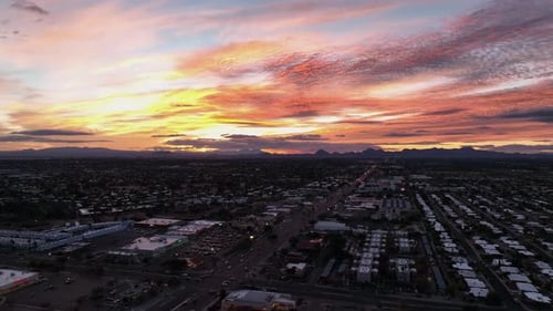 Cinematic slowly rotating drone sunsetting shot during of Tuscon Arizona