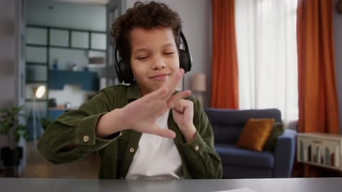 Boy Listening to Music at Home Having Fun