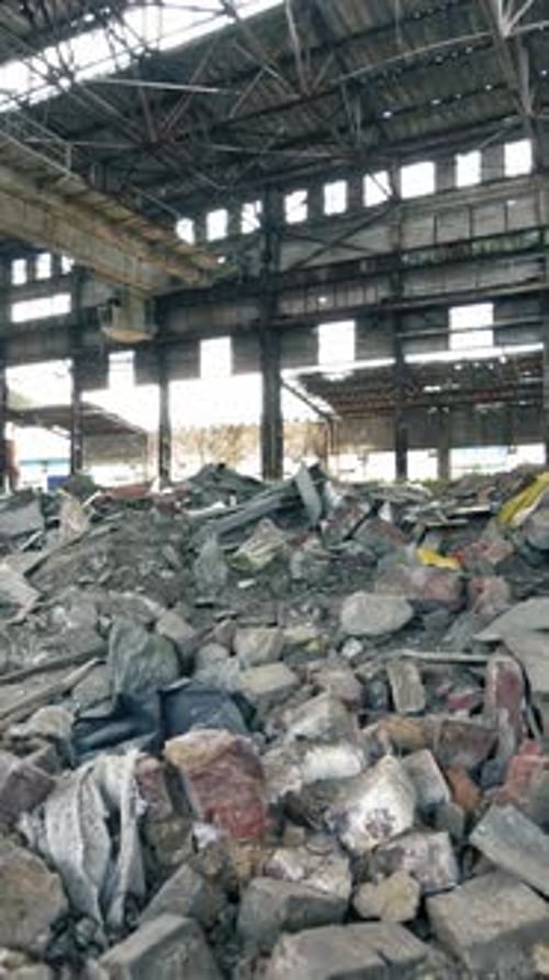 Abandoned Industrial Buildings. Abandoned industrial creepy warehouse inside old dark factory